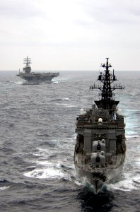 US Navy 070318-N-5961C-226 Japan Maritime Self Defense Force (JMSDF) ship JS Haruna (DDH 141) and USS Ronald Reagan (CVN 76) steam in formation during a photo exercise (PHOTOEX) between Ronald Reagan Carrier Strike Group and JM