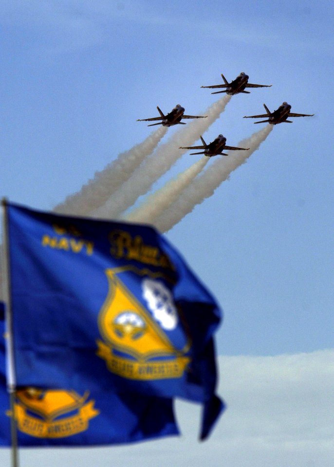 US Navy 070318-F-8769P-113 Four F-A-18 Hornet aircraft from the U.S. Navy Flight Demonstration Squadron Blue Angels fly in formation after taking off at Davis-Monthan Air Force Base, Ariz., during the Aerospace and Arizona Days