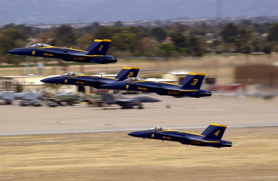US Navy 070317-F-2788H-289 Four F-A-18 Hornet aircraft from the U.S. Navy Flight Demonstration Squadron Blue Angels fly in formation after taking off at Davis-Monthan Air Force Base, Ariz., during the Aerospace and Arizona Days