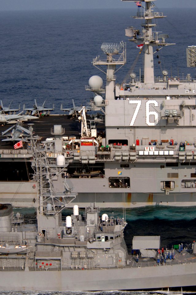 US Navy 070317-N-5961C-160 USS Ronald Reagan (CVN 76) connects to Japan Maritime Self Defense Force (JMSDF) destroyer JS Yuugiri (DD 153) during a fueling at sea ( FAS) evolution