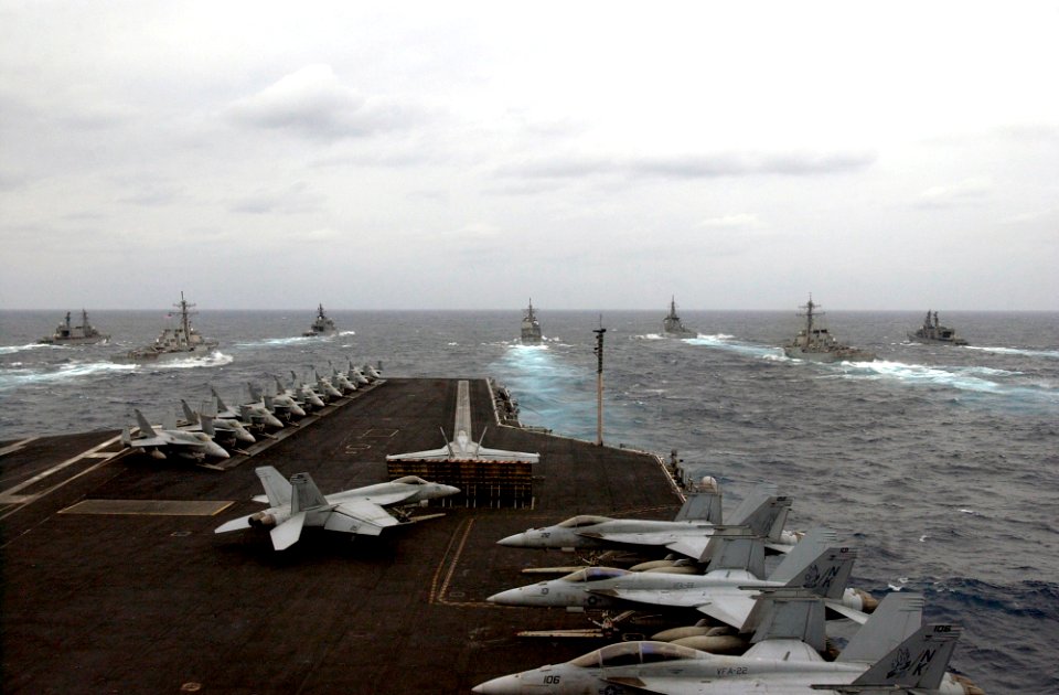 US Navy 070318-N-7130B-420 Steaming in unison, a formation of Ronald Reagan Carrier Strike Group and Japan Maritime Self Defense Force (JMSDF) ships participate in a photo exercise (PHOTOEX)