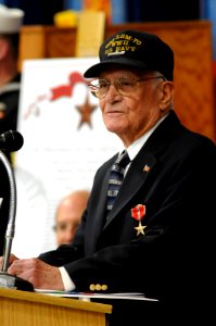 US Navy 070323-N-3642E-429 U.S. Navy veteran Paul E. Baker, delivers his remarks after receiving a Bronze Star with Combat