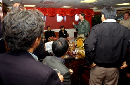 US Navy 070326-N-4009P-013 Commander Carrier Strike Group (CCSG) 7, Rear Adm. Charles Martoglio speaks with guests from the Republic of Korea photo