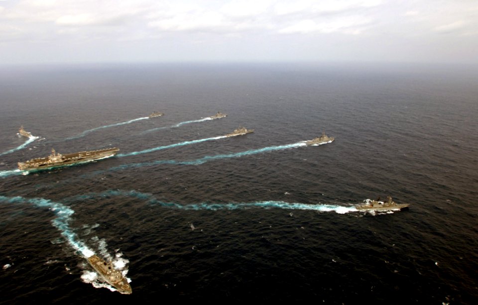 US Navy 070318-N-5961C-374 Ships assigned to Ronald Reagan Carrier Strike Group (CCSG 7) and Japan Maritime Self-Defense Force (JMSDF) break away from formation following a photo exercise (PHOTOEX)