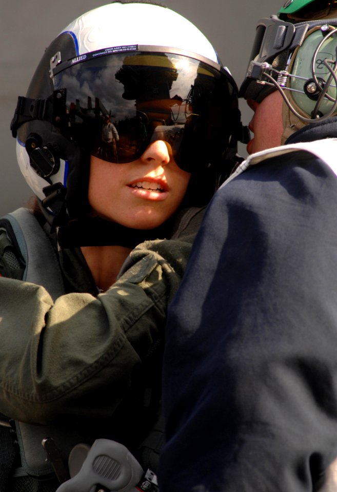 US Navy 070321-N-5345W-076 Lt. Kristin Thompson, a Naval Aviator assigned to the Raging Bulls of Strike Fighter Squadron (VFA) 37 receives a brief passdown