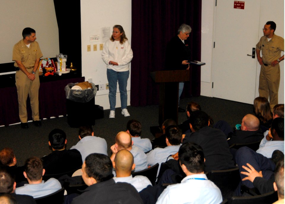 US Navy 070326-N-7656R-002 Sailors assigned to fast attack submarine USS Honolulu (SSN 718) listen to Mothers Against Drunk Drivers (MADD) representative Nora Sizemore
