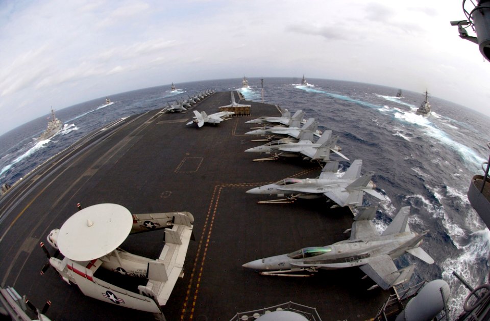 US Navy 070318-N-7130B-590 Ships assigned to Ronald Reagan Carrier Strike Group and Japan Maritime Self-Defense Force (JMSDF) steam in formation during a photo exercise (PHOTOEX)