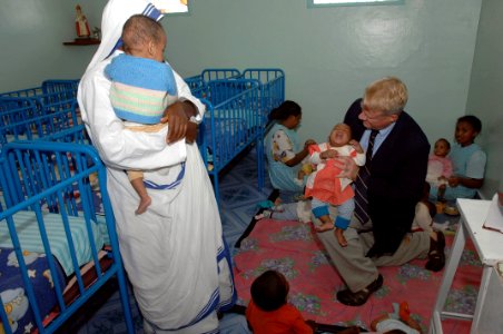 US Navy 070321-F-0524H-130 Chaplain Cmdr. W.M. Sonny Dinkins talks with a nun from the Sisters of Charity Baby Clinic in Antananarivo during a trip to meet with area religious leaders photo