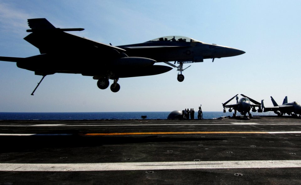US Navy 070323-N-8923M-059 An F-A-18F assigned to Strike Fighter Squadron (VFA) 32 makes an arrested recovery aboard Nimitz-class aircraft carrier USS Harry S. Truman (CVN 75)