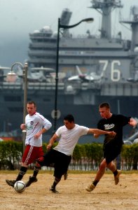 US Navy 070324-N-4009P-114 Sailors from USS Ronald Reagan (CVN 76) participate in a game of soccer while on liberty during a port call in Busan