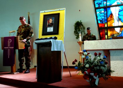 US Navy 070322-N-3857R-003 Friends and family mourn the loss of Gunner's Mate 2nd Class Jared D. Krutke of Naval Mobile Construction Battalion (NMCB) 74 at a memorial ceremony held in the base chapel