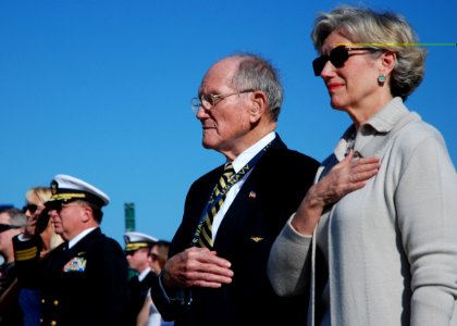 US Navy 070323-N-4565G-005 The first commanding officer of USS John F. Kennedy (CV 67), retired Rear Adm. Earl P. Yates places his right hand over his heart during the playing of the national anthem at the beginning of the deco