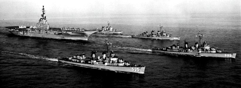 USS Essex (CVS-9) underway with destroyers c1961
