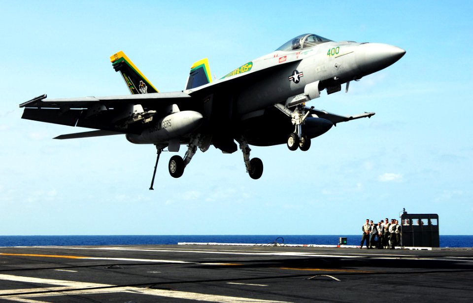 US Navy 070326-N-8923M-008 An F-A-18E Super Hornet, assigned to the Gunslingers of Strike Fighter Squadron (VFA) 105, prepares to make an arrested recovery aboard Nimitz-class aircraft carrier USS Harry S. Truman (CVN 75)