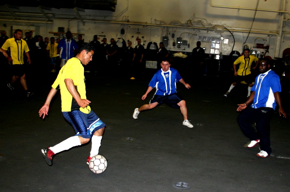 US Navy 070326-N-1328S-001 Crew members from the Engineering and Air Departments aboard the amphibious assault ship USS Boxer (LHD 4) compete in the championship indoor soccer match during the ship's 2007 Captain's Cup