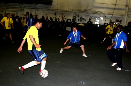 US Navy 070326-N-1328S-001 Crew members from the Engineering and Air Departments aboard the amphibious assault ship USS Boxer (LHD 4) compete in the championship indoor soccer match during the ship's 2007 Captain's Cup