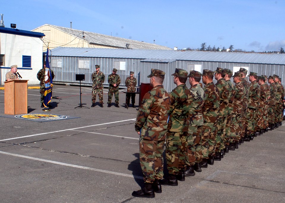 US Navy 070328-N-6247M-036 Vice Commander, Naval Reserve Forces Command, Rear Adm. Robert Passmore speaks to members of Explosive Ordnance Disposal Mobile Unit (EODMU) 11 during an awards ceremony