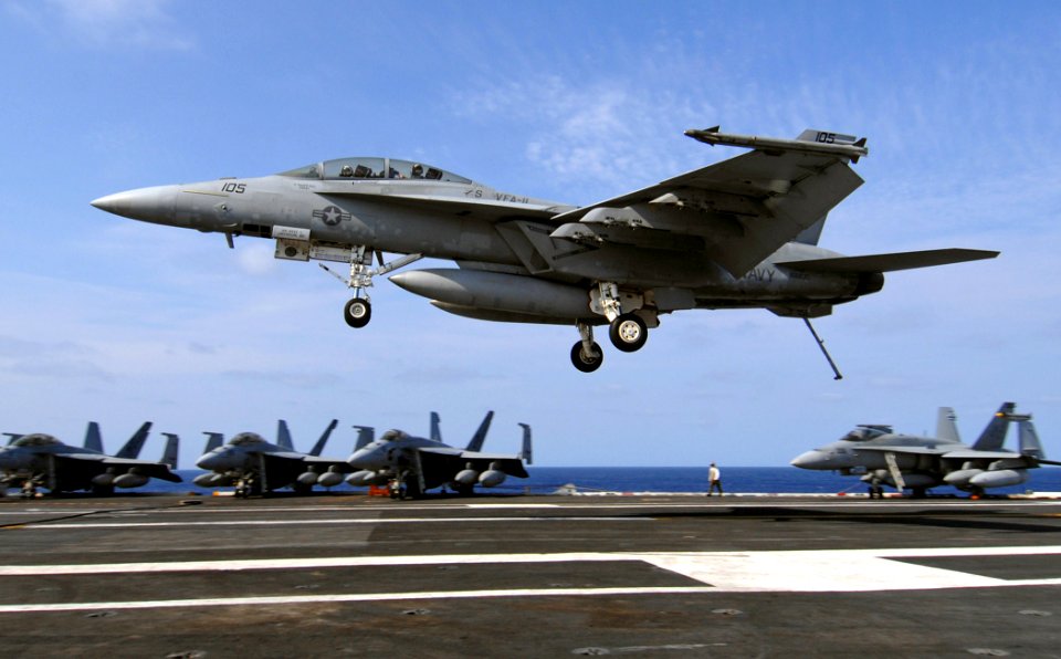 US Navy 070327-N-5345W-089 An F-A-18F Super Hornet assigned to the Red Rippers of Strike Fighter Squadron (VFA) 11, prepares for an arrested landing aboard the Nimitz-class aircraft carrier USS Harry S. Truman (CVN 75)