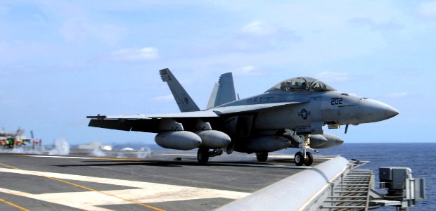 US Navy 070327-N-5345W-077 An F-A-18F Super Hornet, assigned to the Swordsmen of Strike Fighter Squadron (VFA) 32, launches from waist catapult number three during flight operations