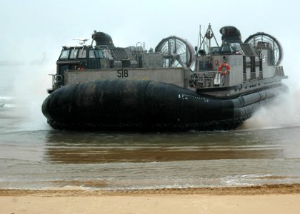 US Navy 070329-N-6710M-035 Landing Craft Air Cushions (LCAC) assigned to Beach master Unit (BMU) 5 WESTPAC prepare to onload equipment while on Republic of Korea shores in support of Foal Eagle 07