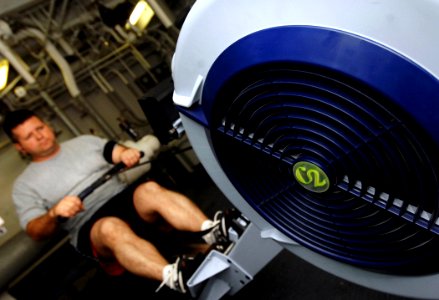 US Navy 070329-N-8923M-029 Lt. Shaun Estep of Strike Fighter Squadron (VFA) 37, the Raging Bulls, prepares for the physical readiness test (PRT) on a rowing machine