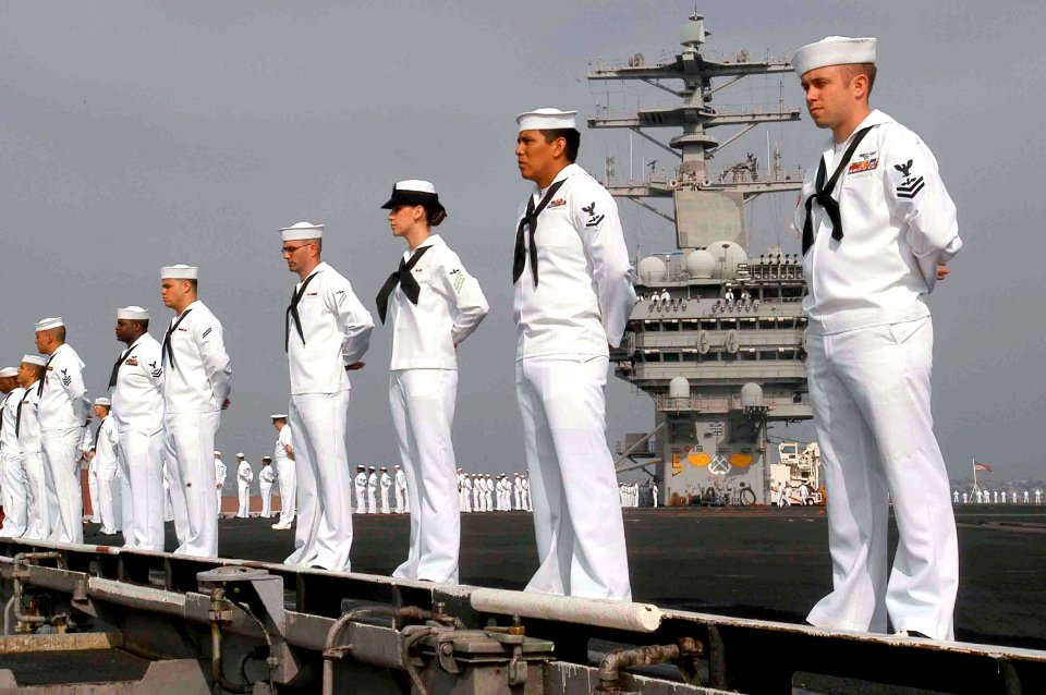 US Navy 070402-N-5484G-117 Sailors aboard nuclear-powered aircraft carrier USS Nimitz (CVN 68) man the rails