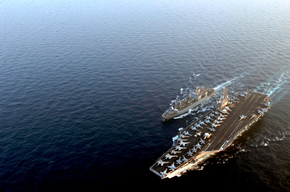 US Navy 070328-N-7130B-104 Nimitz-class aircraft carrier USS Ronald Reagan (CVN 76) comes alongside Military Sealift Command (MSC) ammunition ship USNS Kiska (T-AE 35) for an ordnance offloading evolution