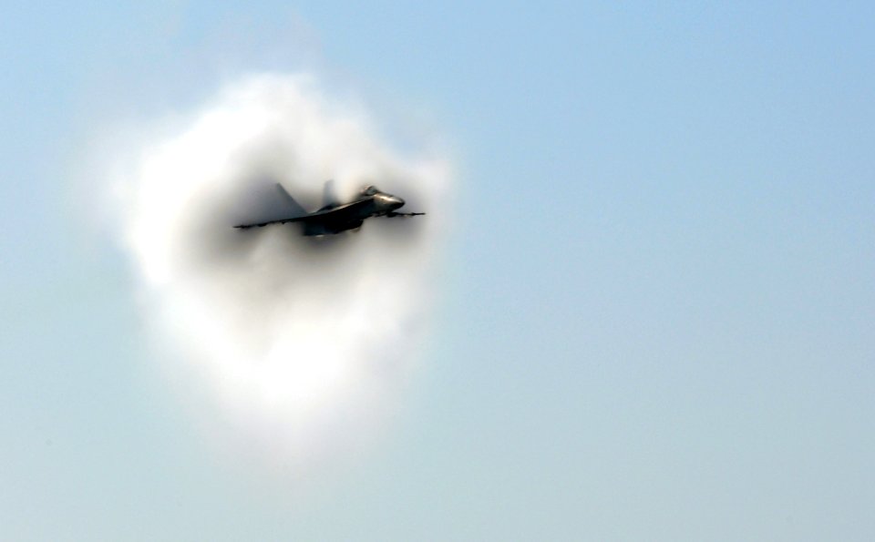 US Navy 070403-N-7130B-138 An F-A-18C Hornet, assigned to the Fist of the Fleet of Strike Fighter Squadron (VFA) 25, breaks the sound barrier