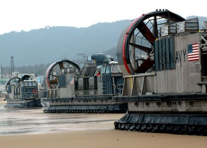 US Navy 070329-N-6710M-019 Landing Craft Air Cushions (LCAC) assigned to Beachmaster Unit (BMU) 5 WESTPAC prepare to onload equipment while on Republic of Korea shores in support of Foal Eagle 07