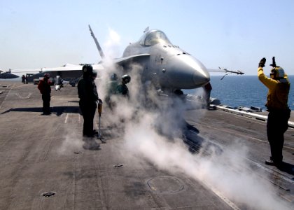 US Navy 070329-N-6854D-002 An F-A-18C Hornet, assigned to the Wildcats of Strike Fighter Squadron (VFA) 131, prepares to launch from the flight deck of Nimitz-class aircraft carrier USS Dwight D. Eisenhower (CVN 69)