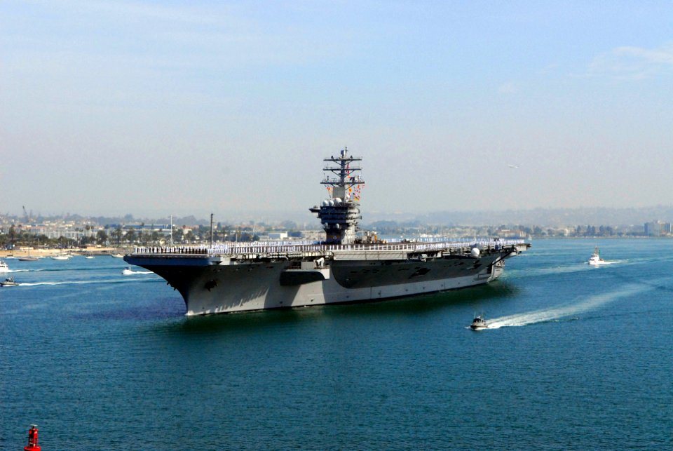 US Navy 070402-N-6326B-121 Nuclear-powered aircraft carrier USS Nimitz (CVN 68) gets underway from Naval Air Station North Island on a scheduled deployment