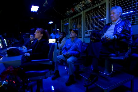 US Navy 070329-N-8591H-063 Alex Trebek of the trivia game show Jeopardy along with USO members and the Jeopardy film crew receive a brief about USS Kitty Hawk's (CV 63) capabilities