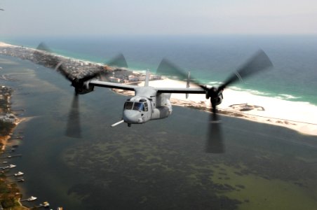 US Navy 070330-F-4684K-031 An MV-22 Osprey from Marine Medium Tiltrotor Training Squadron (VMMT) 204, Marine Corps Air Station New River, N.C., flies over the Gulf of Mexico photo