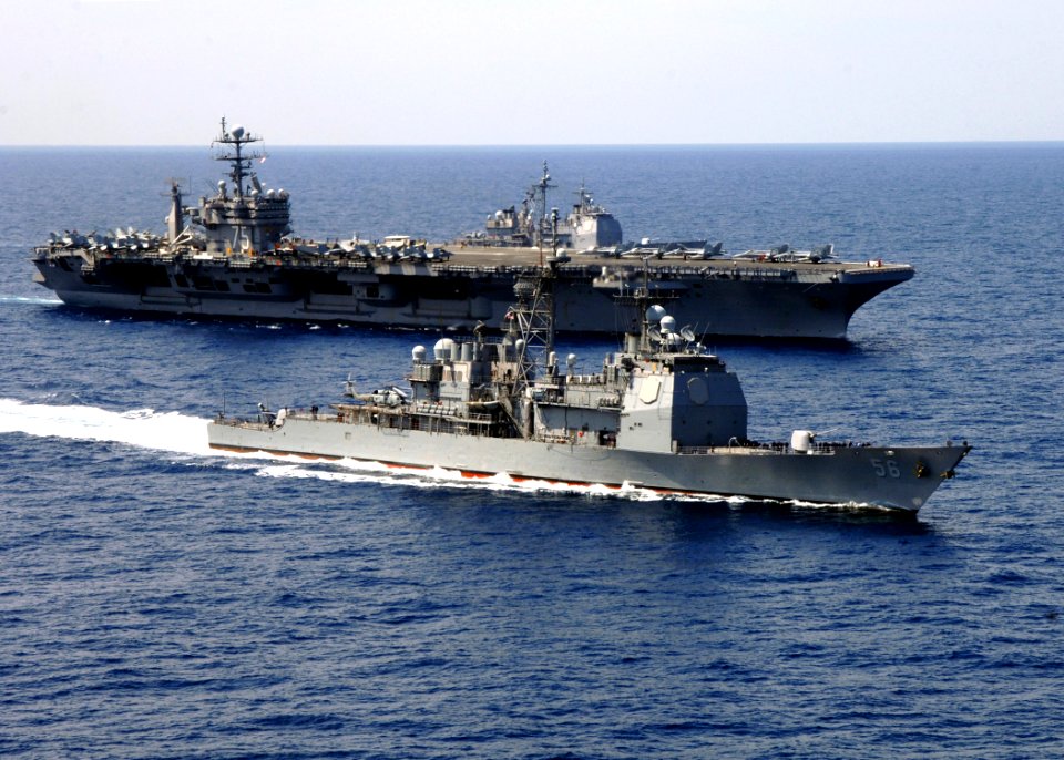 US Navy 070403-N-0535P-280 Ticonderoga-class cruisers USS San Jacinto (CG 56) and USS Hue City (CG 66) steam alongside USS Harry S. Truman (CVN 75) underway in the Atlantic Ocean