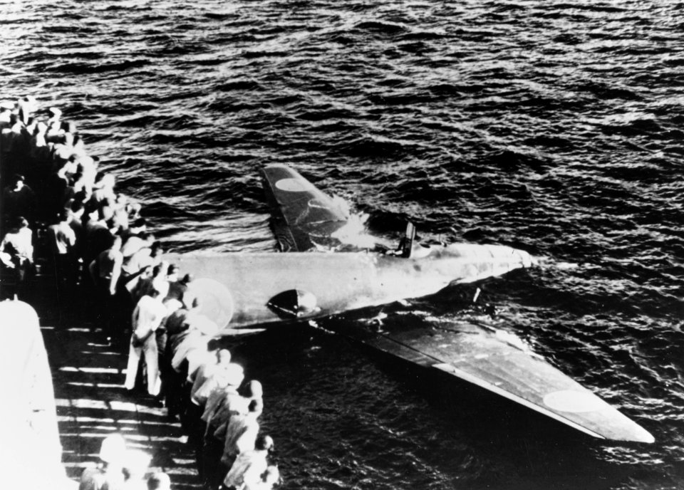 USS Ellet (DD-398) passes a crashed Mitsubishi G4M floating off Tulagi on 8 August 1942 (80-G-19205)