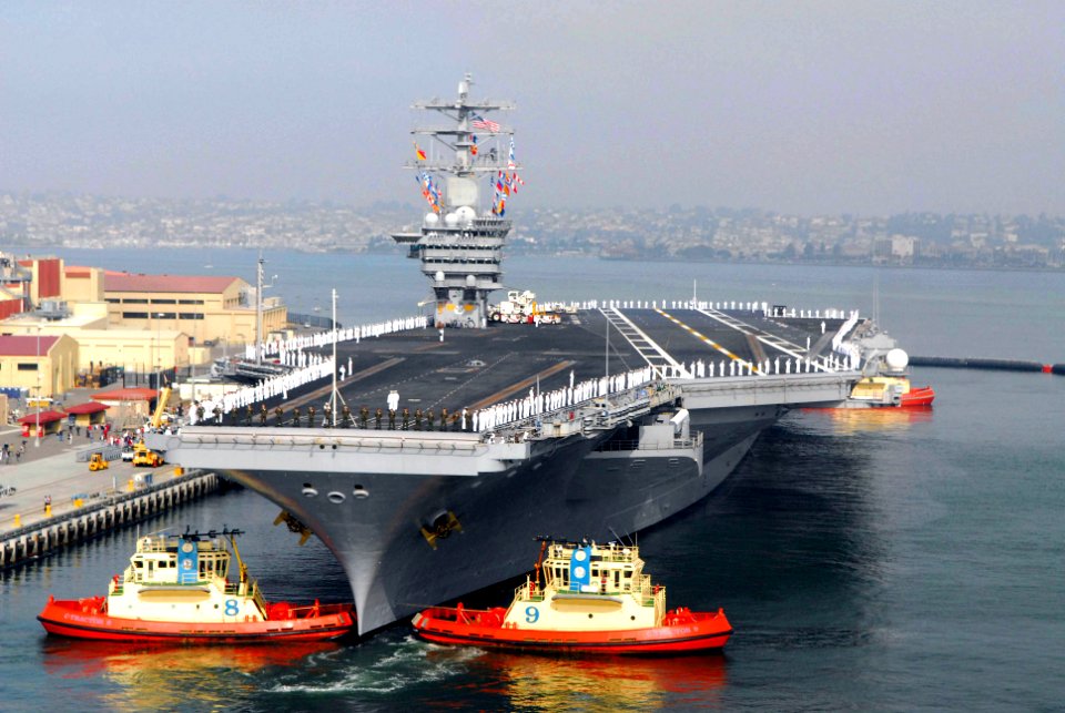 US Navy 070402-N-6326B-068 The nuclear-powered aircraft carrier USS Nimitz (CVN 68) gets underway from Naval Air Station North Island on a scheduled deployment