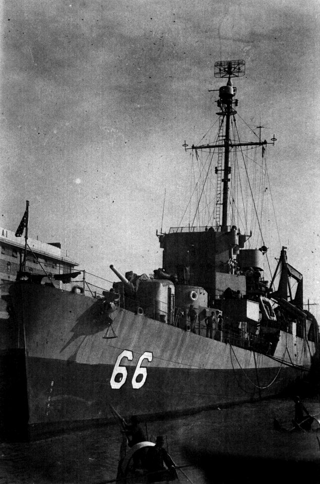 USS Enright (APD-66) docked on the Whangpoo River at Shanghai, China, 23 November 1945