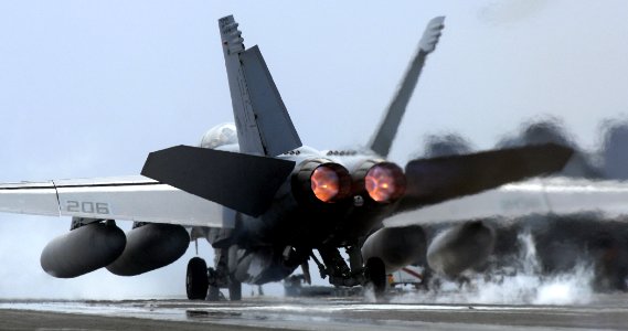 US Navy 070404-N-5345W-013 An F-A-18F Super Hornet assigned to the Swordsmen of Strike Fighter Squadron (VFA) 32 hits the afterburners