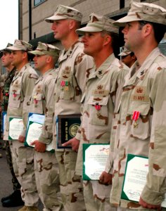 US Navy 070403-N-4163T-011 Sailors assigned to Explosive Ordinance Disposal Mobile Unit (EODMU) 3 receive the Bronze Star Medal during an awards presentation ceremony