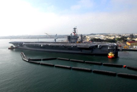 US Navy 070402-N-6326B-080 Nuclear-powered aircraft carrier USS Nimitz (CVN 68) gets underway from Naval Air Station North Island on a scheduled deployment