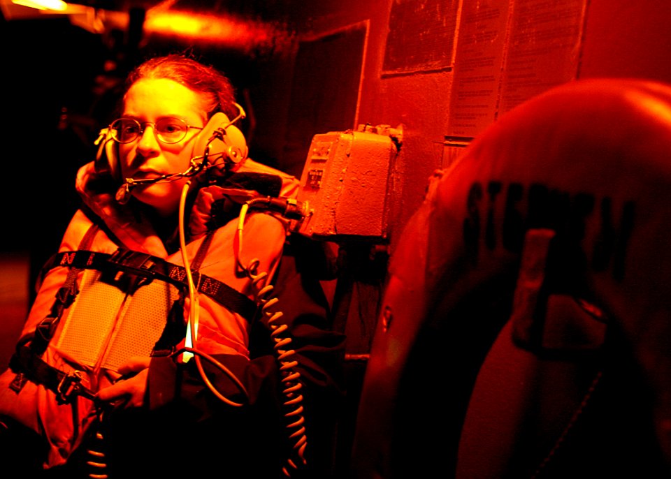 US Navy 070406-N-4953E-009 Seaman Jessica Koehne stands watch as the boat deck phone talker during an underway replenishment with the Royal Australian auxiliary oiler replenishment (AOR) vessel HMAS Success