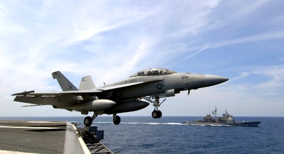 US Navy 070403-N-5345W-152 An F-A-18F Super Hornet from the Swordsmen of Strike Fighter Squadron (VFA) 32 launches from the Nimitz-class aircraft carrier USS Harry S. Truman (CVN 75)