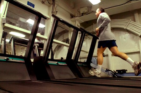 US Navy 070406-N-7130B-187 In the aft gym aboard the aircraft carrier USS Ronald Reagan (CVN 76), Master Chief Electronics Technician James Poletto, from New Milford, Conn., runs on the treadmill