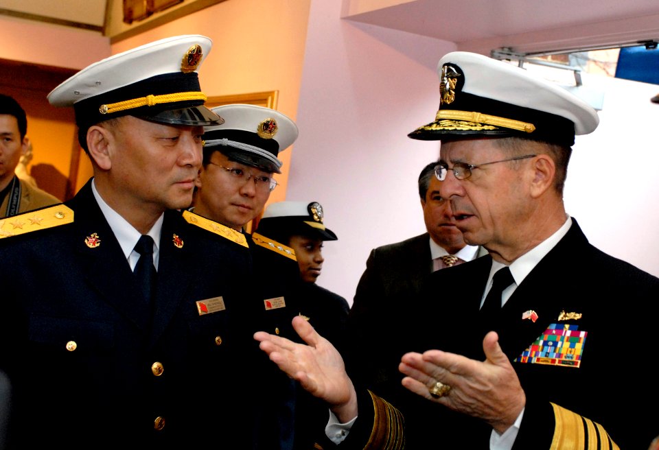 US Navy 070404-N-0696M-018 Chief of Naval Operations (CNO) Adm. Mike Mullen speaks with Chinese People's Liberation Army Navy Commander-in-Chief Adm. Wu Shengli, after a Full Honors Ceremony