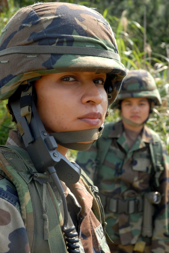 US Navy 070405-N-0775Y-039 Yeoman 2nd Class Rosa Medina, attached to Naval Mobile Construction Battalion (NMCB) 3 is the communicator for a squad preparing to go on a land navigation course at Camp Hansen