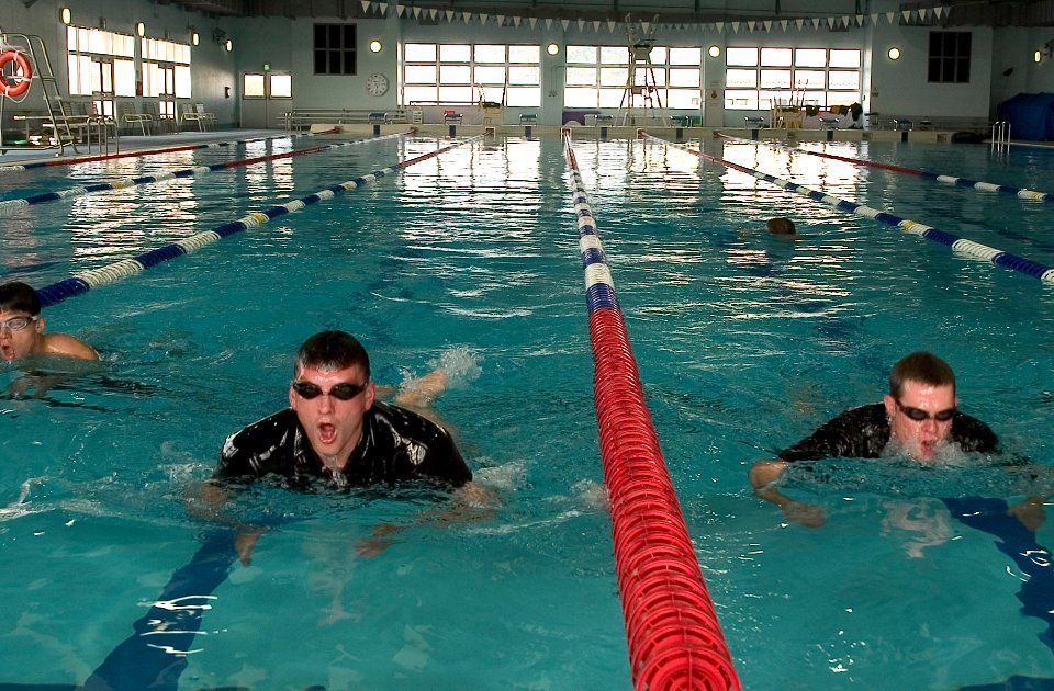 US Navy 070411-N-2638R-001 Search and rescue (SAR) swimmers swim laps during training at the Seahawk Natatorium on board Commander Fleet Activities Yokosuka