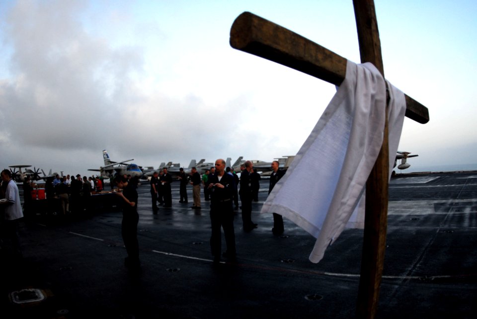 US Navy 070408-N-9928E-099 Sailors enjoy a reception with pastries and fruit provided by supply department after the Easter Sunrise Service on the flight deck of Nimitz-class aircraft carrier USS John C. Stennis (CVN 74)