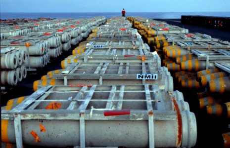 US Navy 070406-N-4133B-039 Aviation ordnceman stand at the far end of staged ordnance on board Nimitz-class aircraft carrier USS Ronald Reagan (CVN 76)