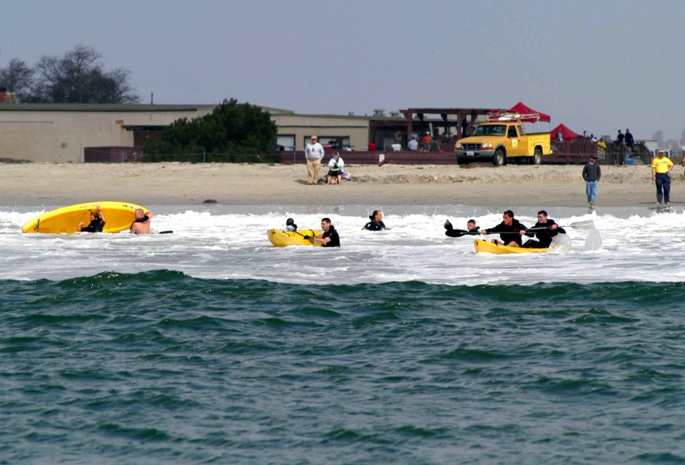 US Navy 070412-N-9604C-005 Rescue swimmers wrestle with a rip tide during the kayaking event at the annual Naval Helicopter Aviation (NHA) Symposium 2007 Aircrew Competition