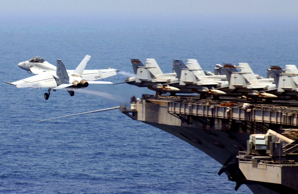 US Navy 070413-N-0684R-032 An F-A-18F Super Hornet, from the Black Knights of Strike Fighter Squadron (VFA) 154, launches from the flight deck of Nimitz-class aircraft carrier USS John C. Stennis (CVN 74)